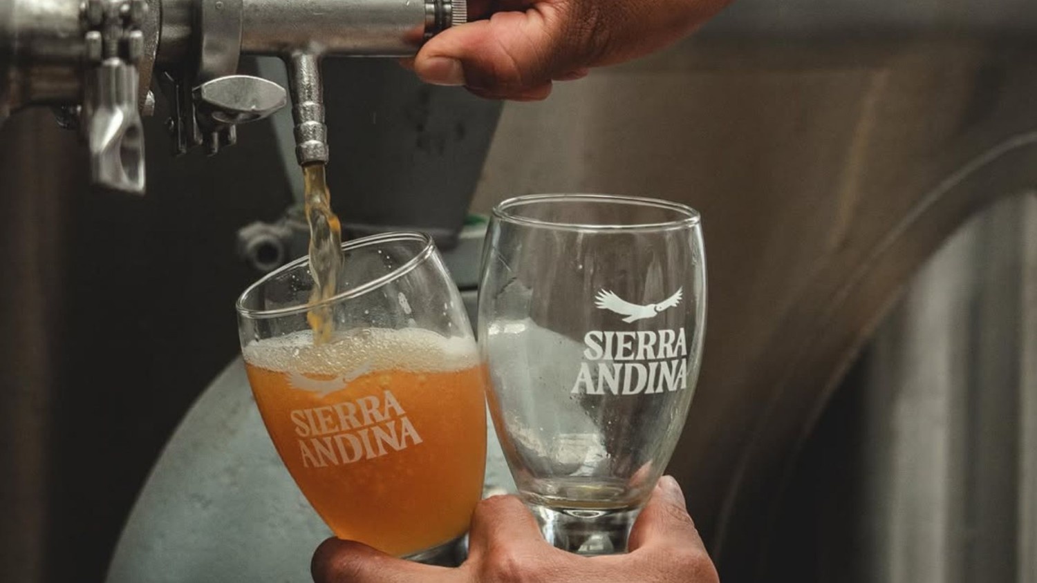 Craft beer being poured at Sierra Andina Brewery in Huaraz, Peru – local flavors to try when visiting Huaraz.